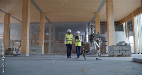 On Building Construction Site Humanoid Robots Collaborate With Engineers. AI Construction Work, Autonomous Material Handling, Advanced Building Automation, Active Development, Algorithmic Optimization