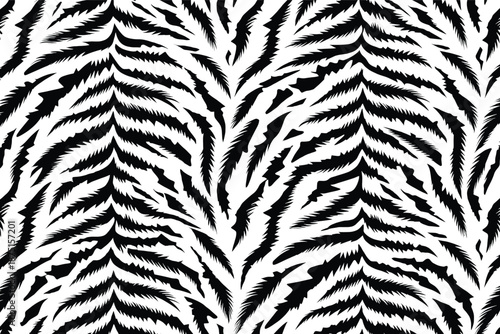 A close-up view of a zebra pattern featuring black and white stripes on animal fur texture