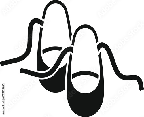 Ballet pointe shoes with ribbons representing grace and performance