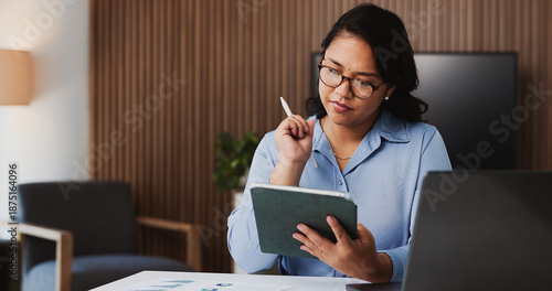 Photos Financial advisor, thinking and woman in office, tablet and decision with checklist for trading portfolio