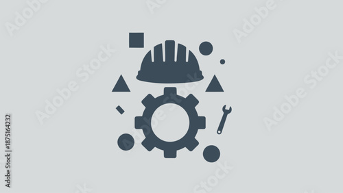 Industrial engineering concept with hard hat, gear, and tools on gray background for manufacturing, construction, and technology designs