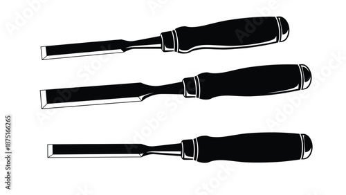 Three black handled chisels with metal blades and tips