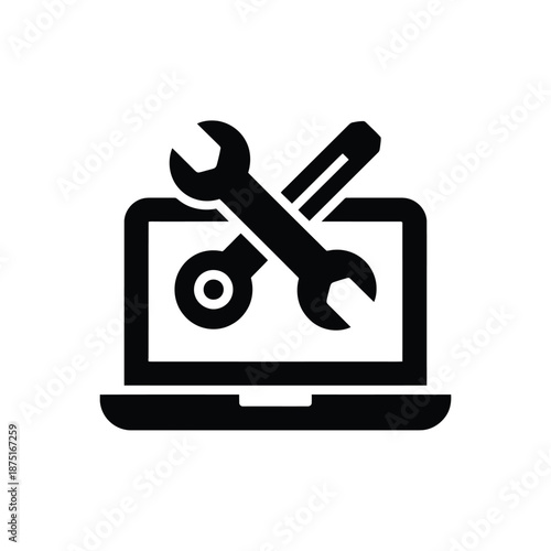Laptop computer with wrench and spanner on screen for maintenance