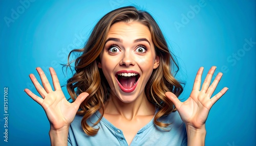 Surprised woman with excited facial expression.