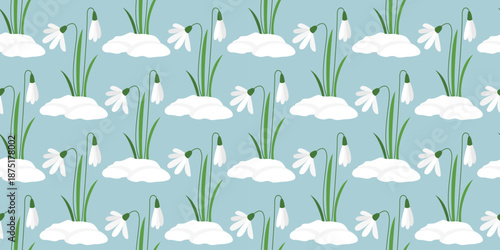 Early awakening of flowers in forest seamless pattern. Snowdrops in snow on blue background. Spring floral print for textiles, paper, fabric, packaging, vector graphics