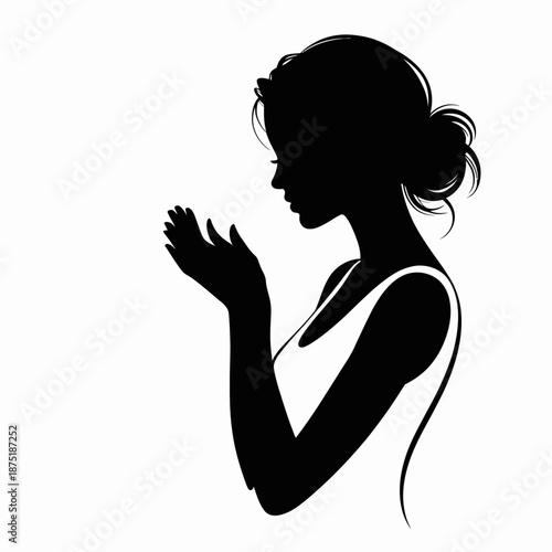 A peaceful silhouette of a woman gently holding her hands together, exuding tranquility and contemplation, symbolizing inner reflection and emotional depth in elegant simplicity.
