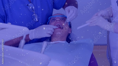 Animation of pattern and purple tint over patient in dentist chair and dentists