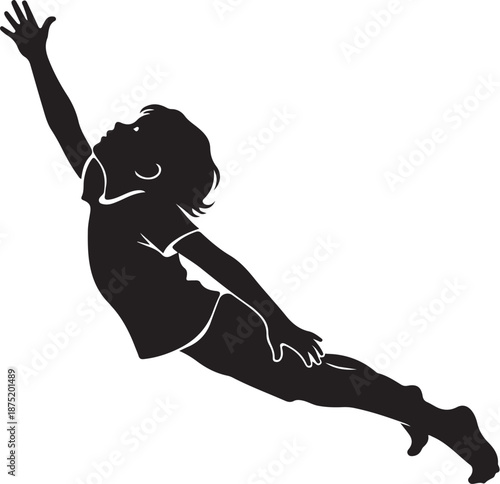 Silhouette of a happy child jumping in the air