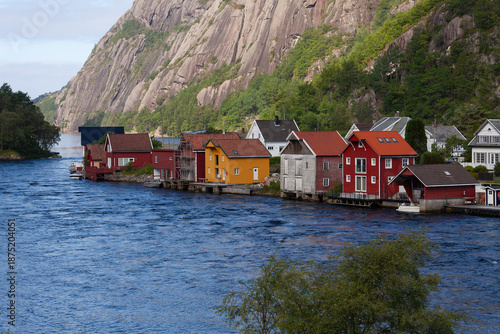 Historical wooden houses in a sleepy village by the river. Summer, Sireåna (Sireåna), Agder, Norway.