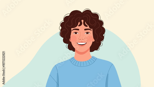 A cheerful person with curly brown hair and a light blue sweater smiles