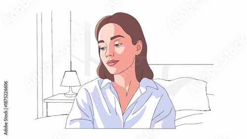 A young woman with brown hair sits on a bed, wearing a white shirt, with a lamp on a bedside table