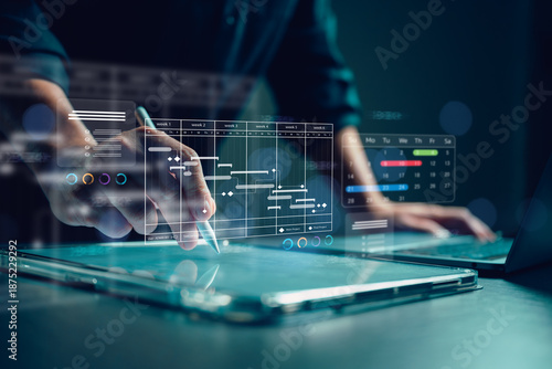 Project manager using stylus on tablet with hologram Gantt chart schedule interface. Business planning, timeline management, and digital workflow concept for corporate strategy efficiency.