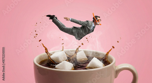 A surreal businessman in a suit wearing a snorkel diving into a large cup of hot coffee with sugar cubes splashing against a pink background