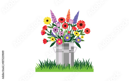 Colorful flowers in silver milk can on green grass