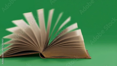 Old Book Pages Flipping Rapidly on a Green Screen Background, Symbolizing Knowledge and Information Transfer