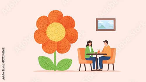 A couple enjoys coffee at a table, with a large crochet flower and framed art