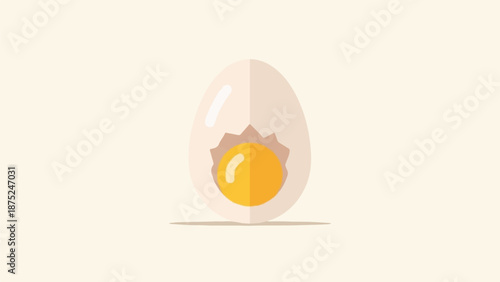 A cracked egg with a bright yellow yolk is shown on a neutral background