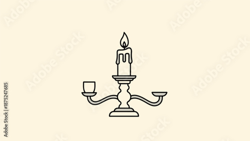 A lit candle sits in a classic three-branched candelabra on a light background