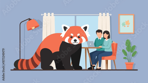 A playful red panda sits beside a couple working on a laptop indoors