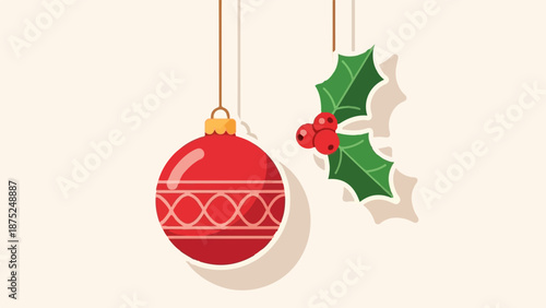 A festive Christmas ornament hangs beside holly with red berries
