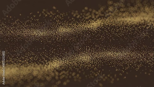 Golden particles flowing in waves against dark background
