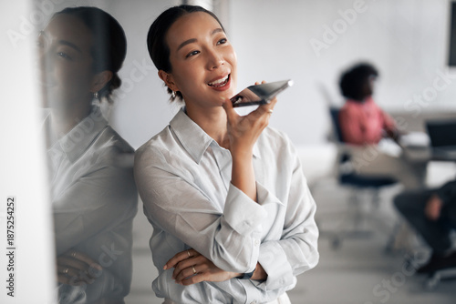 Photography Asian businesswoman using phone speakerphone for communication