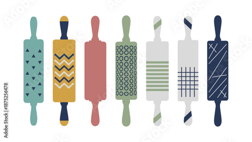 Colorful rolling pins arranged for baking and cooking isolated on white background