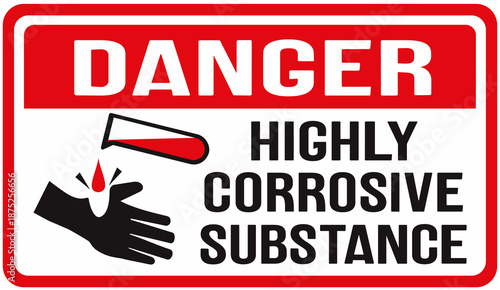 Sign that says : danger,  highly corrosive substance