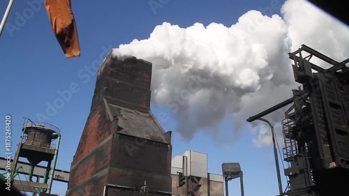 Coke oven plant in operation producing hard but reactive metallurgical coke for blast furnace use.