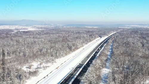 Zagreb-Karlovac-Split highway in Croatia, near Karlovac. Highway going through the snow covered landscape in winter time.