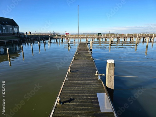 Photos Pier on the lake. Volendam fishing village of the Netherlands.