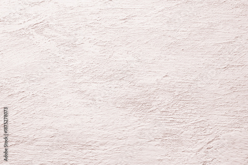 Light pink beige plaster texture background with soft rough surface