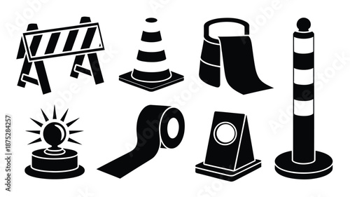 Road construction signs and barriers in black and white