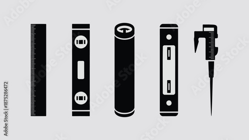 Black silhouettes of construction tools on gray background