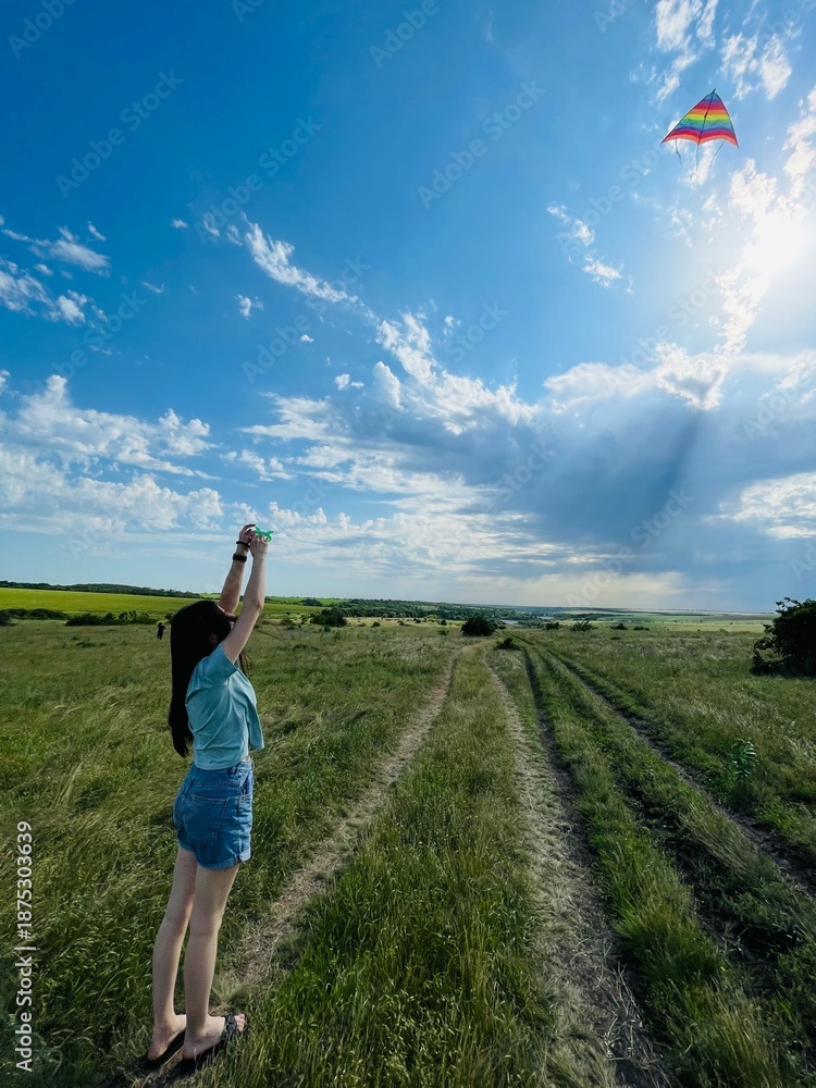 Fototapeta premium young man jumping in the field