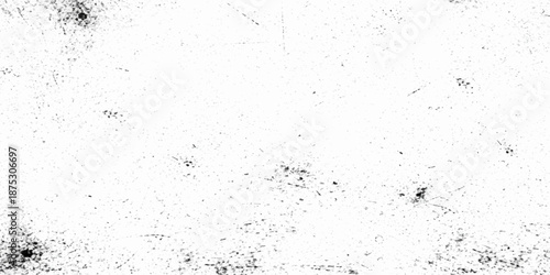 Aged black and white grunge background with a rough textured surface of dirty concrete and vintage paper material for a retro wall design