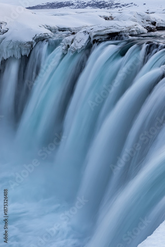 Godafoss waterfall, Iceland landscape on winter evening in cold colors