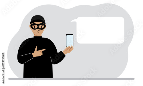 Hacker in a black mask with a mobile phone. The cybercriminal is holding a smartphone. Cyber attack, mobile phishing, scam.