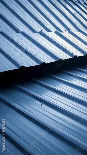 Metal roof panels angled diagonally in cool tones; close-up of ribbed material