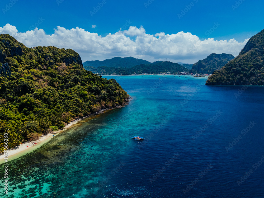 custom made wallpaper toronto digitalaerial view of El Nido, Philippines, featuring emerald lagoons, limestone karst islands, and vibrant tropical waters