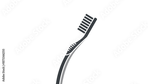 Close-up of a black and white toothbrush on white background.