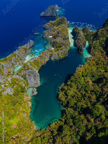 Wallpaper Mural Crystal-clear turquoise water surrounded by dramatic limestone cliffs in the Big and Small Lagoons of Palawan Torontodigital.ca