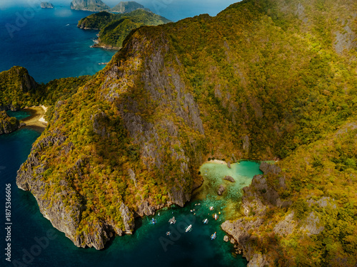 Wallpaper Mural Crystal-clear turquoise water surrounded by dramatic limestone cliffs in the Big and Small Lagoons of Palawan Torontodigital.ca