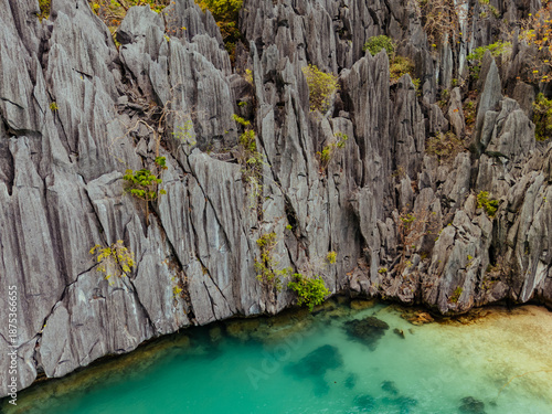 Wallpaper Mural Crystal-clear turquoise water surrounded by dramatic limestone cliffs in the Big and Small Lagoons of Palawan Torontodigital.ca