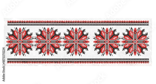 Traditional Ukrainian embroidery pattern with red and black geometric motifs on white fabric