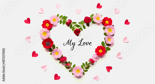 Heart shaped floral arrangement with "My Love" text and scattered paper hearts
