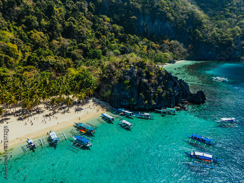 Wallpaper Mural White sand beach with calm turquoise water and lush tropical scenery, capturing the natural beauty of the Philippine coastline Torontodigital.ca