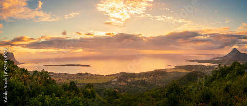 Panorama of  Mauritius beach with indian ocean and dramatic sky at sunset, summer concept,Mauritius island