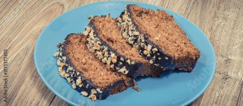 Pieces of zucchini dough with nuts and raisins. Delicious dessert