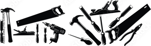 Collection of assorted hand and power tools, including hammers, saws, drills, and chisels, for construction and DIY projects